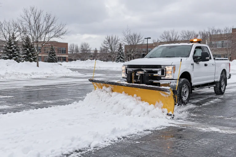 Illustrative front-mounted pickup snowplow